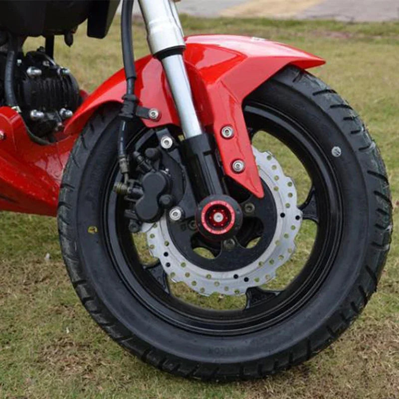 4 pezzi di protezione universale per ruote per moto Crash Pad protezioni per crash per moto in lega Motocross che cade tazze per cursori forcella anteriore